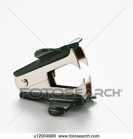 Stock Photo - Staple remover on white background.. Fotosearch