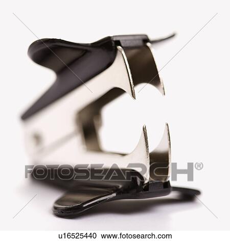 Staple remover on white background with selective focus. View Large Photo Image Stock Image - Staple remover on white background with selective focus.. Fotosearch