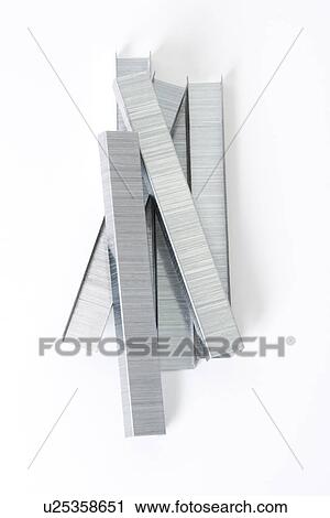 Staples piled together. View Large Photo Image Stock Image - Staples piled together. . Fotosearch