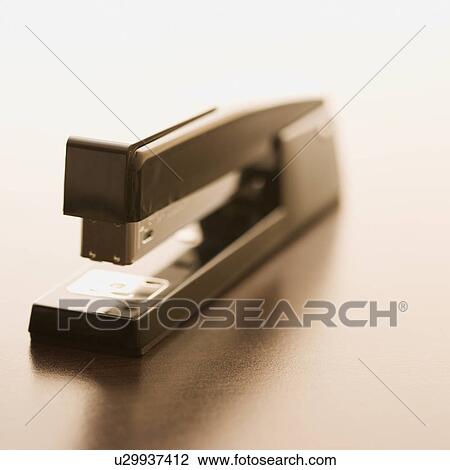 Still life of stapler. View Large Photo Image Stock Image - Still life of stapler.. Fotosearch
