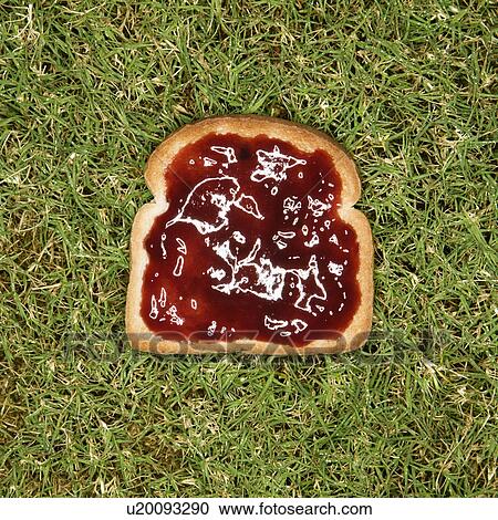 Slice of toast with jam on grass. View Large Photo Image Stock Image - Slice of toast with jam on grass.. Fotosearch