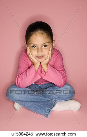 Girl sitting looking at viewer View Large Photo Image Stock Photography - Girl sitting looking at viewer. Fotosearch