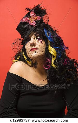 Stock Photo - Woman in unique makeup and clothing. Fotosearch