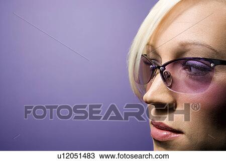 Woman wearing sunglasses View Large Photo Image Stock Image - Woman wearing sunglasses. Fotosearch