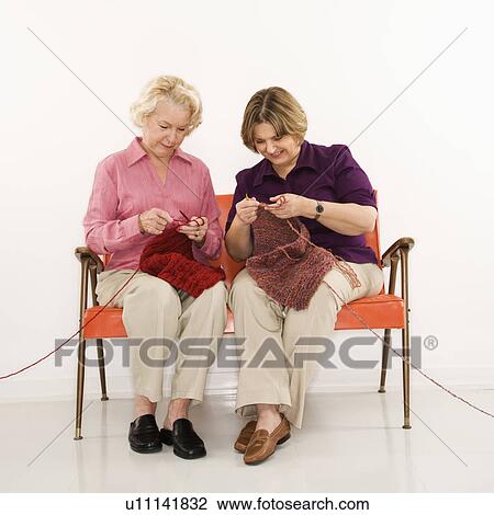 Caucasian middle aged woman and senior woman sitting and knitting. View Large Photo Image Stock Image - Caucasian middle aged woman and senior woman sitting and knitting.. Fotosearch