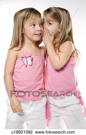 Stock Image - Female children Caucasian twins.. Fotosearch