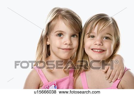 Stock Photo - Female children Caucasian twins.. Fotosearch