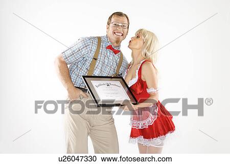 Man dressed like nerd receiving kiss and certificate from woman dressed in french maid outfit View Large Photo Image Stock Image - Man dressed like nerd receiving kiss and certificate from woman dressed in french maid outfit. Fotosearch