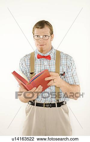 Man dressed like nerd with book open View Large Photo Image Stock Image - Man dressed like nerd with book open . Fotosearch