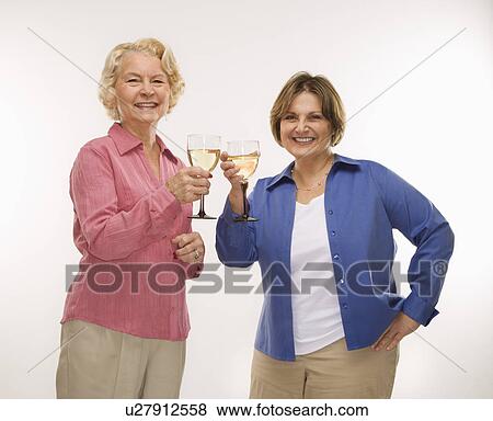 Women toasting wine glasses View Large Photo Image Stock Photo - Women toasting wine glasses. Fotosearch