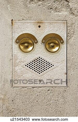 Close-up of ringer and speaker on side of building that look like a face in Venice, Italy View Large Photo Image Stock Image - Close-up of ringer and speaker on side of building that look like a face in Venice, Italy. Fotosearch