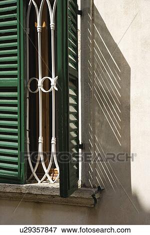 Close-up of window with shutters in Venice, Italy. View Large Photo Image Stock Photo - Close-up of window with shutters in Venice, Italy.. Fotosearch