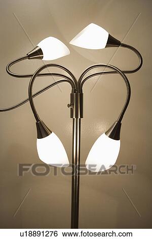 Stock Photograph - Contemporary lamp twisted in different directions. Fotosearch