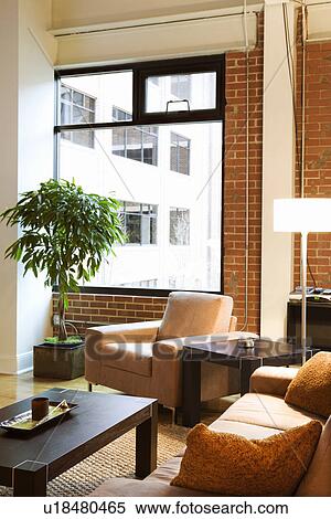 Living area of furnished loft apartment View Large Photo Image Stock Photography - Living area of furnished loft apartment. Fotosearch