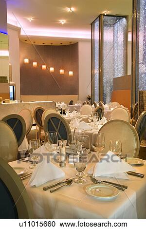 Table in restaurant with place settings View Large Photo Image Stock Image - Table in restaurant with place settings. Fotosearch