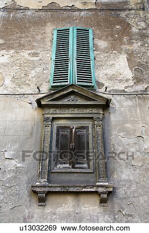 Two shuttered windows in Italy View Large Photo Image Stock Photo - Two shuttered windows in Italy. Fotosearch