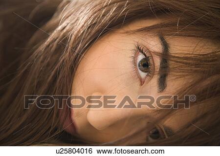 Close up portrait of woman making eye contact. View Large Photo Image Stock Photograph - Close up portrait of woman making eye contact.. Fotosearch