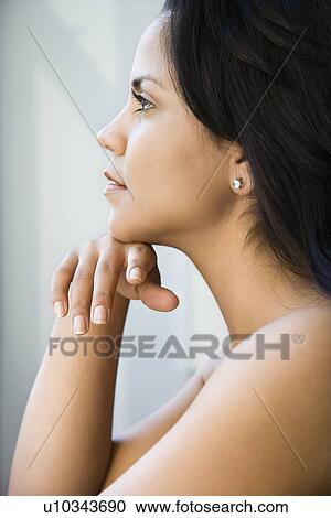 Woman with head on hand View Large Photo Image Stock Image - Woman with head on hand. Fotosearch