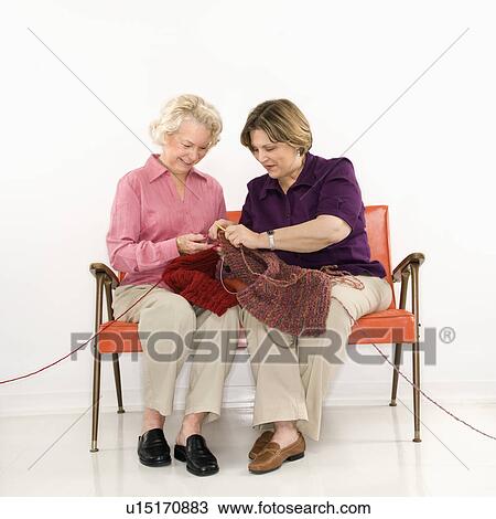 Caucasian middle aged woman and senior woman sitting and knitting. View Large Photo Image Stock Image - Caucasian middle aged woman and senior woman sitting and knitting.. Fotosearch