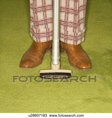 Close-up of male legs in plaid pants with vacuum extension standing on green retro carpet View Large Photo Image Stock Image - Close-up of male legs in plaid pants with vacuum extension standing on green retro carpet. Fotosearch