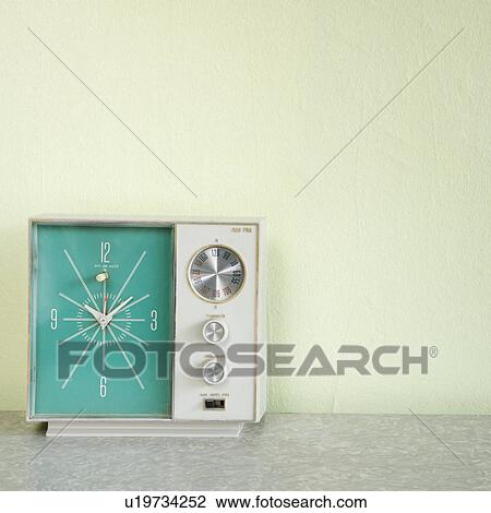 Still life of vintage clock radio with turquois face. View Large Photo Image Stock Image - Still life of vintage clock radio with turquois face.. Fotosearch