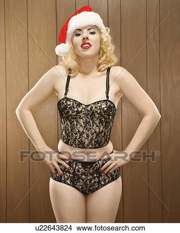 Picture - Woman in holiday attire. Fotosearch