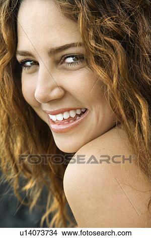 Picture - Female smiling at viewer. Fotosearch
