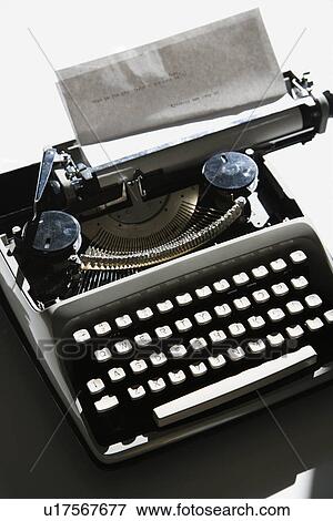Stock Photo - Above view of typewriter with paper.. Fotosearch