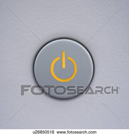 Stock Photo - Close up of power symbol on power button on computer. Fotosearch