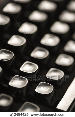 Close up of type levers on typewriter keyboard View Large Photo Image Stock Photography - Close up of type levers on typewriter keyboard. Fotosearch