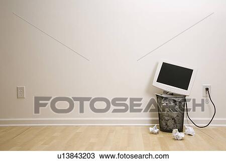 Computer monitor in trash can surrounded by crumpled up paper View Large Photo Image Stock Image - Computer monitor in trash can surrounded by crumpled up paper. Fotosearch