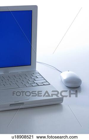 Laptop computer with blue screen and mouse. View Large Photo Image Stock Image - Laptop computer with blue screen and mouse.. Fotosearch
