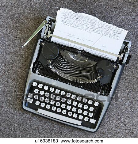 Stock Image - Overview of typewriter with paper that has been typed on.. Fotosearch