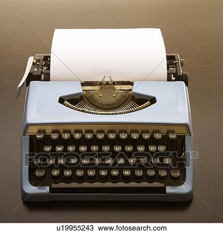 Stock Image - Still life of blank sheet of paper in an old fashioned typewriter. Fotosearch