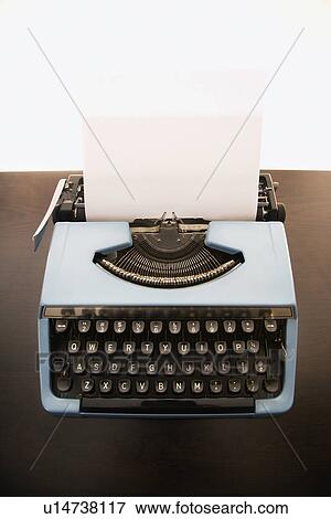 Still life of blank sheet of paper in an old fashioned typewriter. View Large Photo Image Stock Photo - Still life of blank sheet of paper in an old fashioned typewriter.. Fotosearch