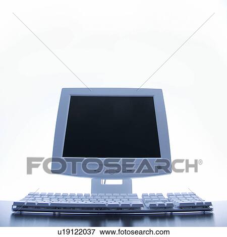 Stock Photo - Still life of computer monitor and keyboard.. Fotosearch