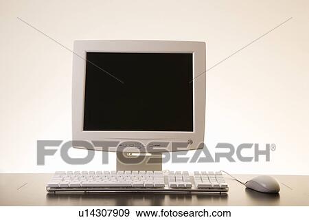 Stock Photo - Still life of computer monitor, keyboard and mouse. Fotosearch