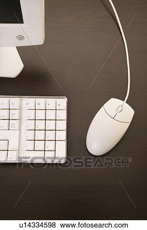 Stock Photo - Still life of computer monitor, keyboard and mouse.. Fotosearch