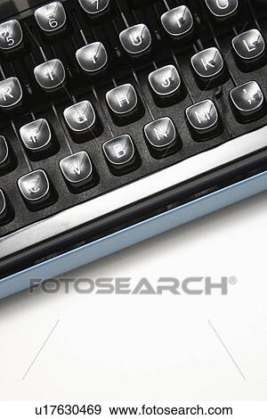 Type levers on typewriter keyboard View Large Photo Image Stock Photo - Type levers on typewriter keyboard. Fotosearch