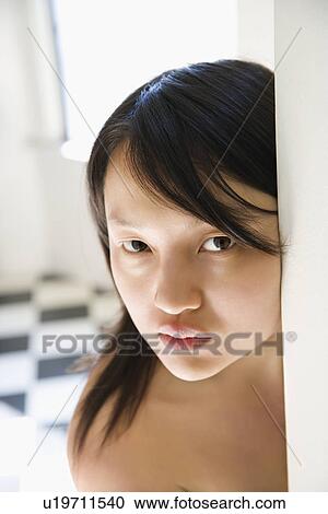 Stock Image - Woman making eye contact. Fotosearch