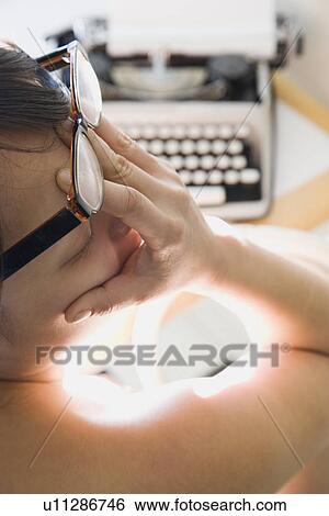 Woman with hand over face View Large Photo Image Stock Photograph - Woman with hand over face. Fotosearch