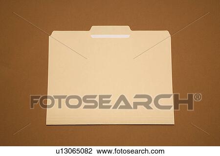 Stock Image - Blank folder on brown background. Fotosearch