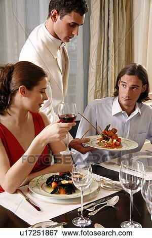 Hotel waiter serving guest View Large Photo Image Stock Photo - Hotel waiter serving guest. Fotosearch