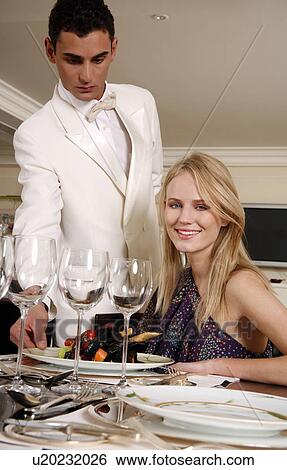 Hotel waiter serving guest View Large Photo Image Stock Photograph - Hotel waiter serving guest. Fotosearch