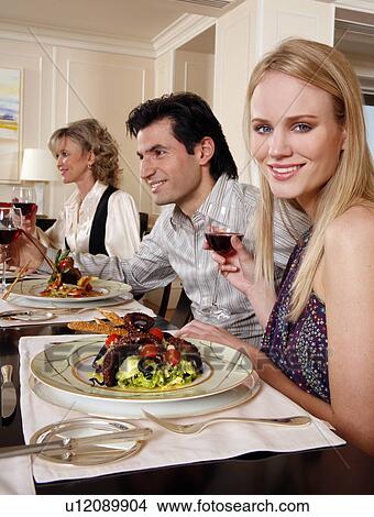 Picture - People dining . Fotosearch
