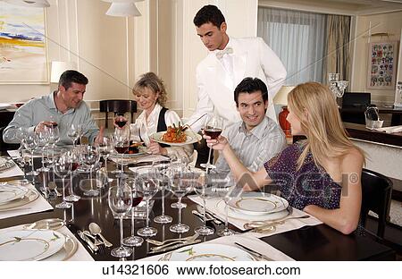 Stock Photograph - People dining . Fotosearch