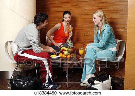 Pilates students at fitness club juice bar View Large Photo Image Stock Image - Pilates students at fitness club juice bar. Fotosearch