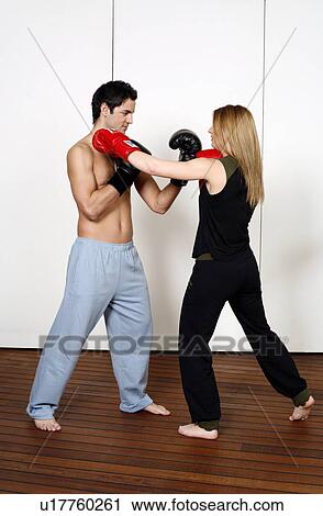 Straight left-hand punch of Active Tae Bo and inside block View Large Photo Image Stock Image - Straight left-hand punch of Active Tae Bo and inside block. Fotosearch