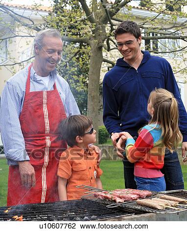 Stock Image - Family barbecue. Fotosearch