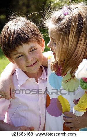Little boy and girl with Easter egg basket View Large Photo Image Stock Photo - Little boy and girl with Easter egg basket. Fotosearch